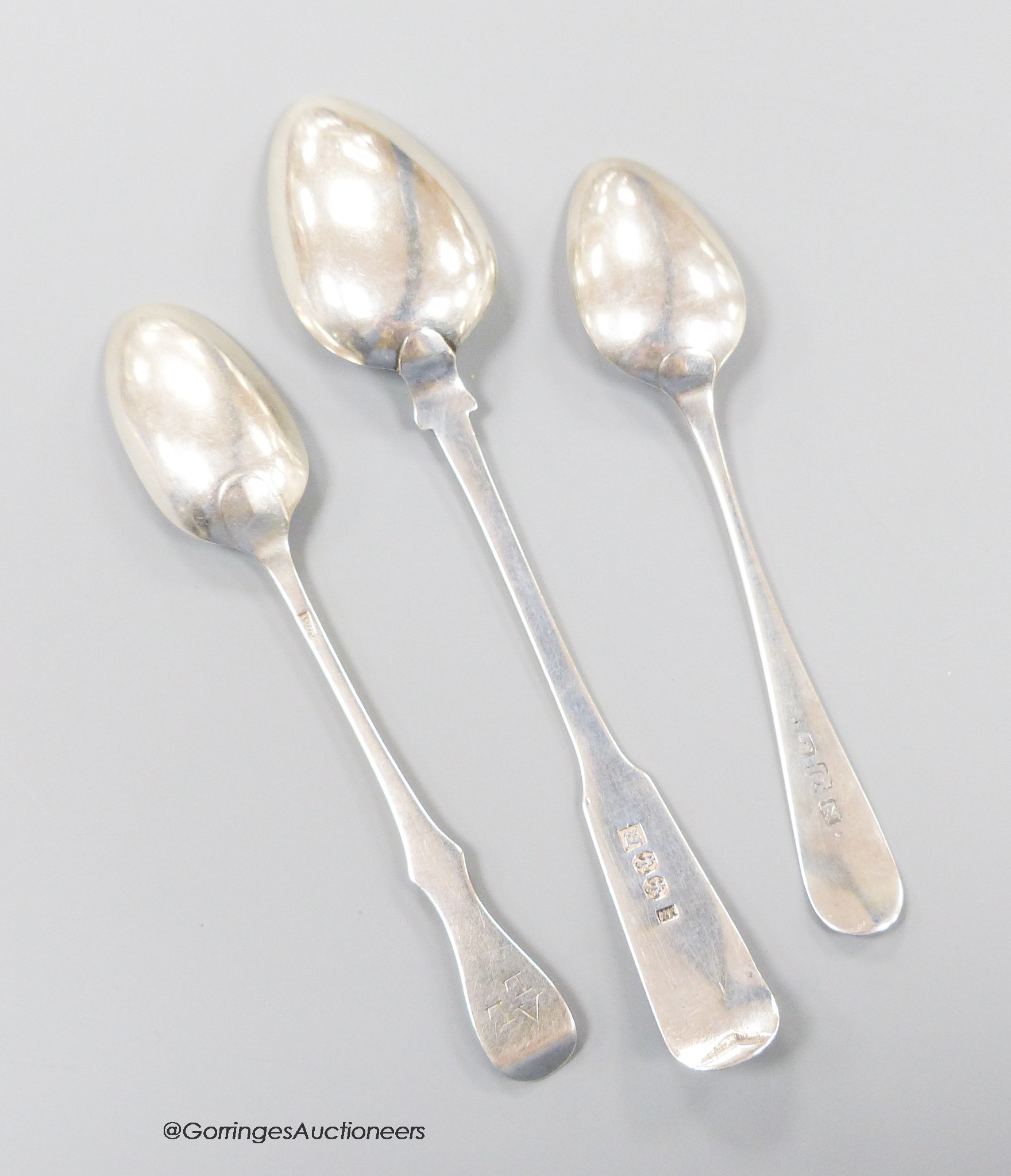 A19th century Scottish provincial silver fiddle pattern teaspoon, Robert Robertson, Cupar, c.1840, 15.1cm and two other smaller teaspoons, Nathaniel Gillert, Aberdeen, c.1800 and William Taylor, Edinburgh, c. 1770, gross